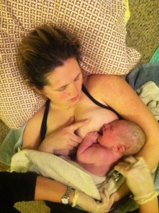 Skin to skin as we wait for the placenta... Laying on the floor beside the tub.